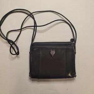 Brighton cross body bag in black pebbled leather.